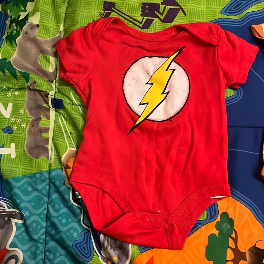 This is a flash onesie red size 0-3 months